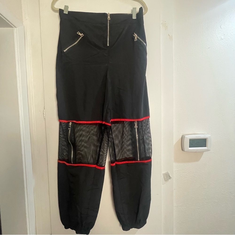 Black Parachute with Red Accents and Mesh Panels